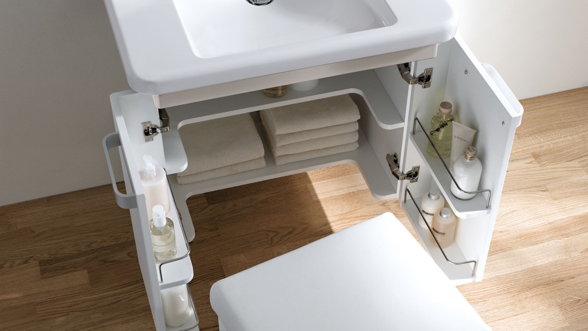 Waschtisch-Unterschrank mit zurückgesetzten Regalböden für mehr Beinfreiheit im Sitzen. Waschtisch-Unterschrank mit zurückgesetzten Regalböden für mehr Beinfreiheit im Sitzen.