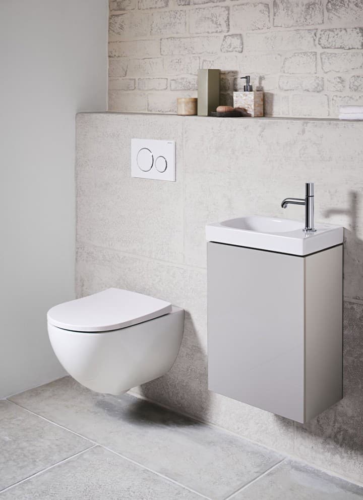 Kleines Bad mit Fliesen in Betonoptik Kleines Bad mit Fliesen in Betonoptik